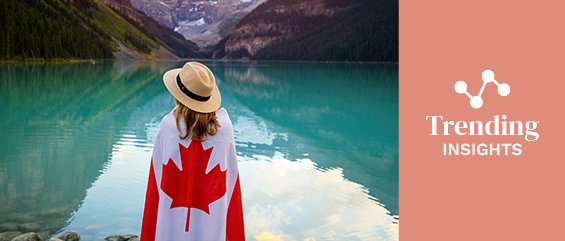 woman wrapped in Canadian flag