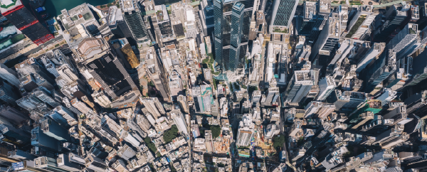 Metropolitan city infrastructure Aerial scenery panoramic view from drone of Hong Kong modern skyscrapers district. Top view, urban downtown with corporate business and financial enterprise buildings. Metropolitan city infrastructure