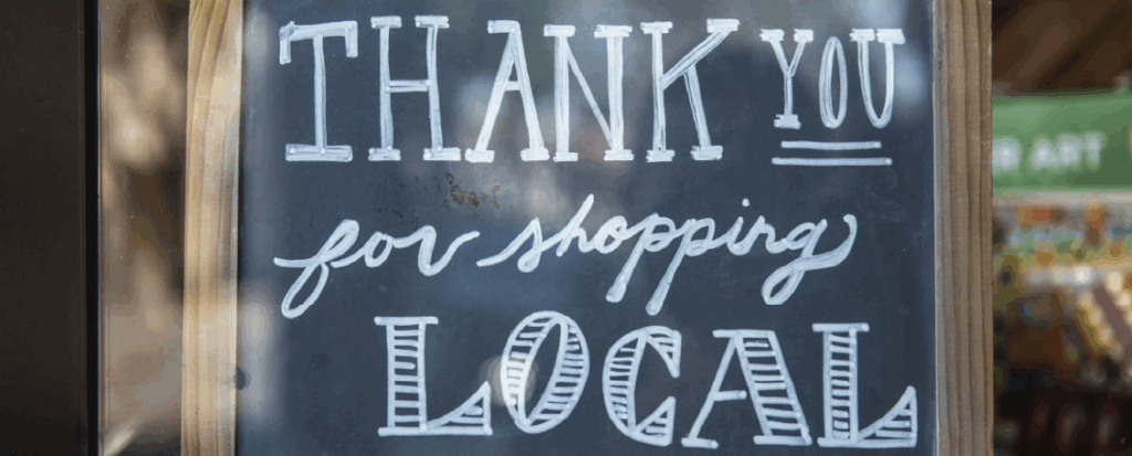 shallow focus photo of thank you for shopping signage