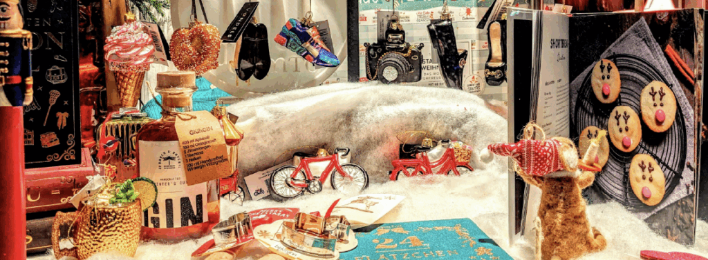 A cheerful and festive Christmas-themed shop window display