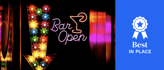 A neon bar open sign with a neon arrow