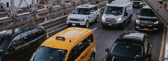 a city street filled with lots of traffic